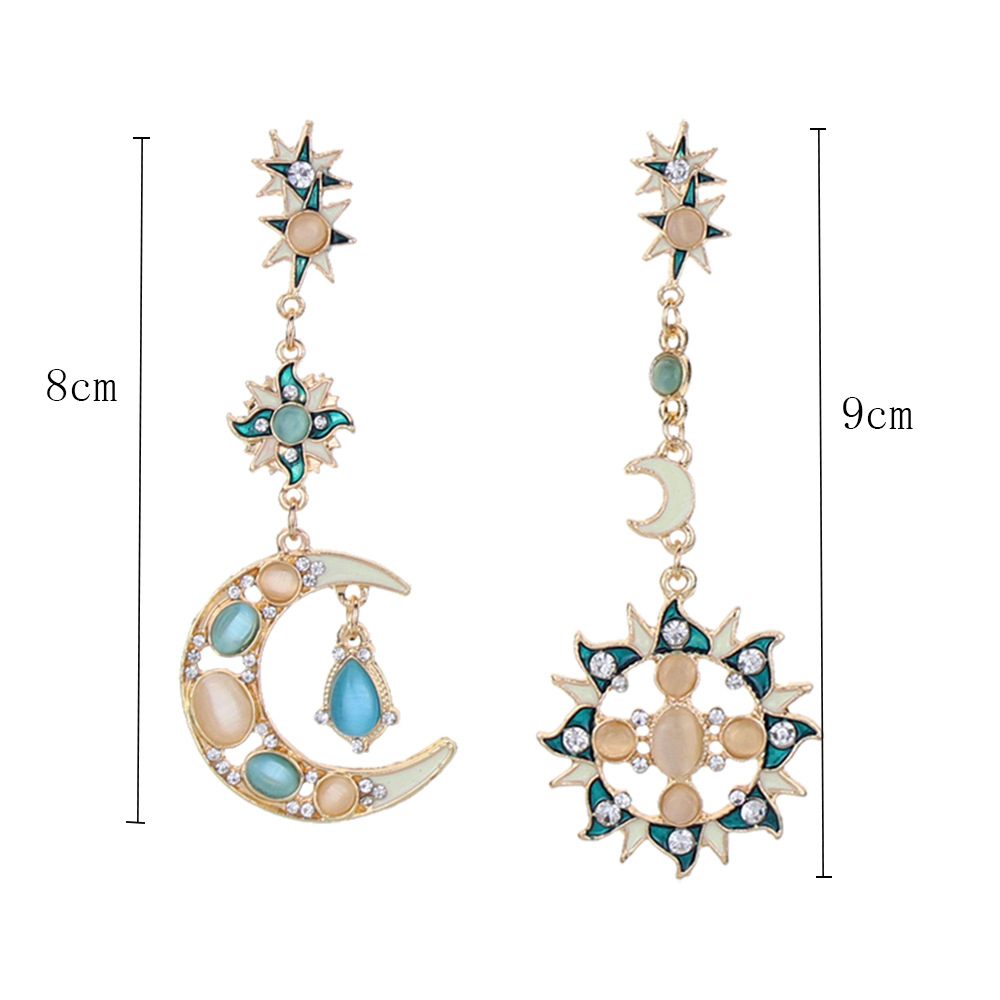 Fashion Rhinestone Opal Inlaid Asymmetric Sun Moon Pendant Ear Studs display picture 1