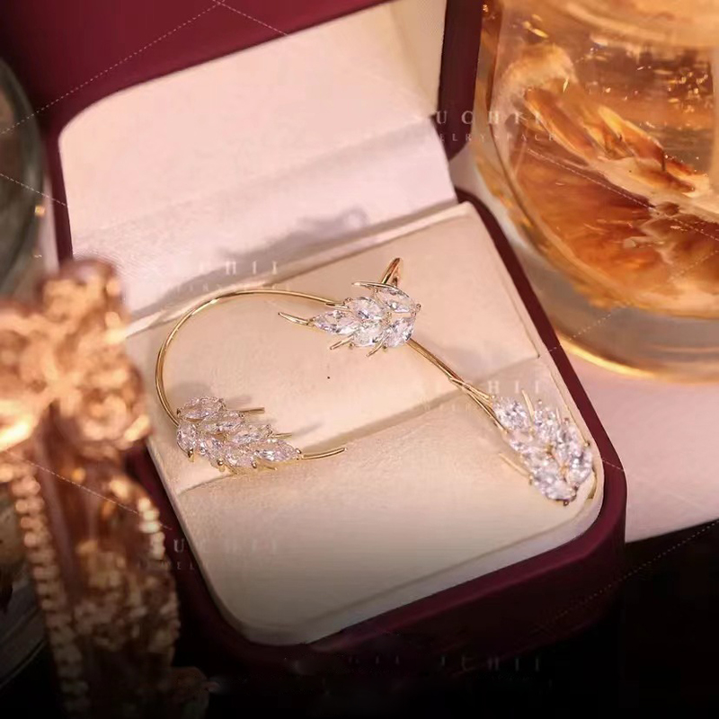 Fashion Elegant Shining Diamond Feather Zircon Inlaid One-piece Ear Clip display picture 1