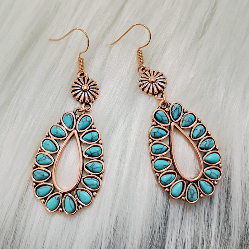 Retro Style Hollow Water Drop Shape Inlaid Turquoise Pendant Earrings display picture 1