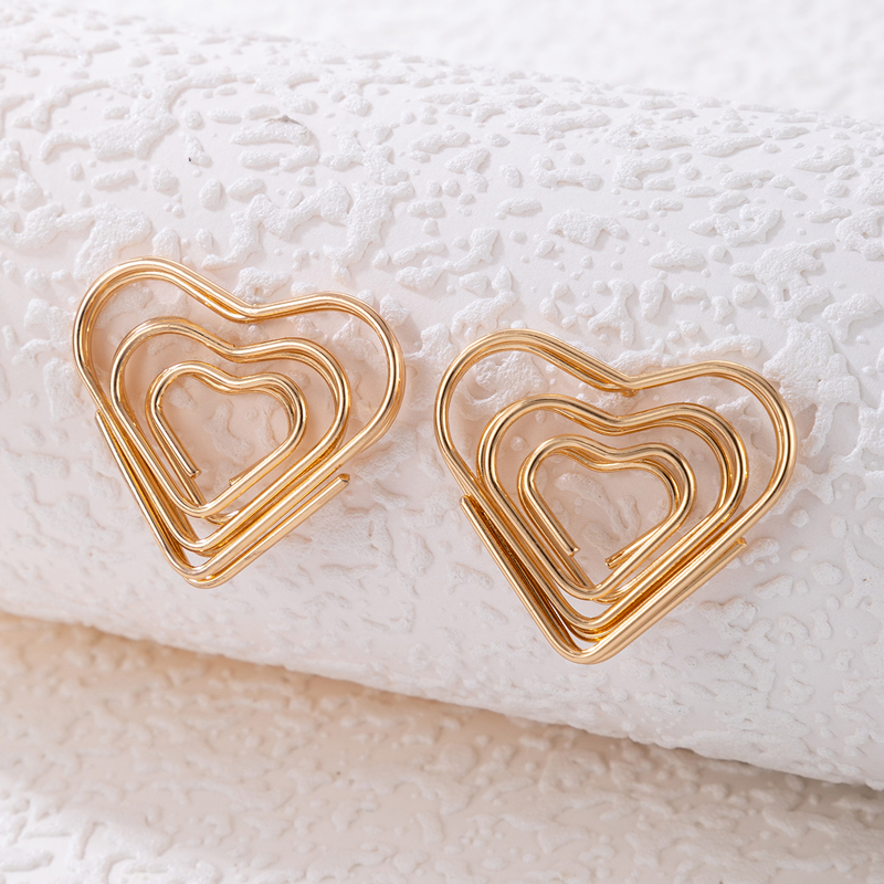 Simple Geometric Triangle Spiral Hollow Heart Shape Alloy Stud Earrings display picture 5