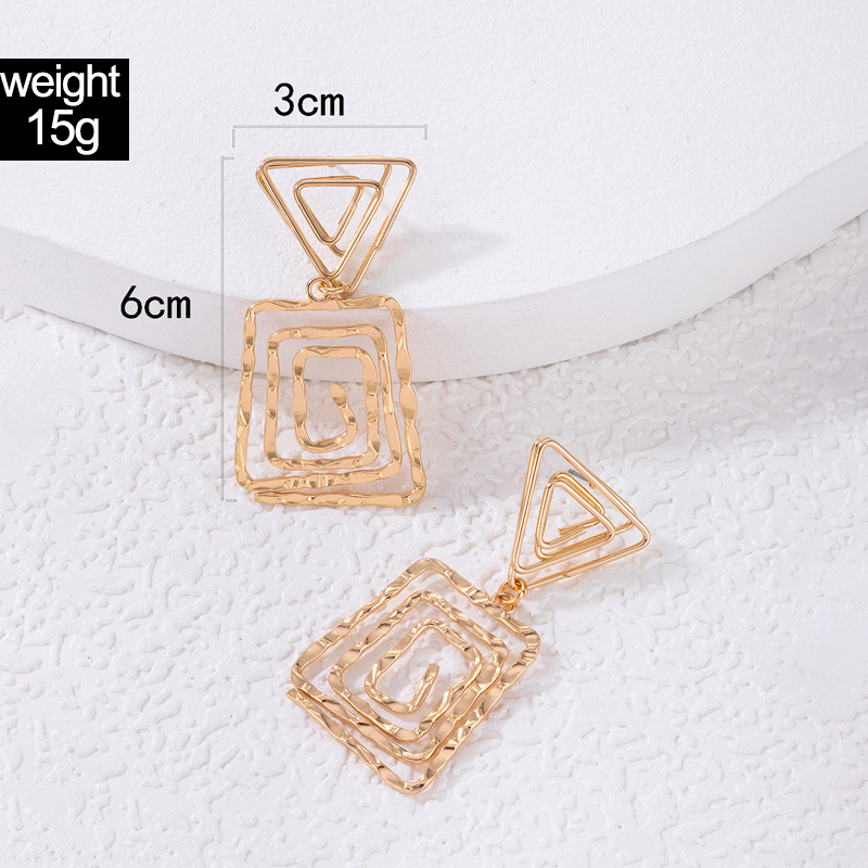 Simple Geometric Triangle Spiral Hollow Heart Shape Alloy Stud Earrings display picture 6