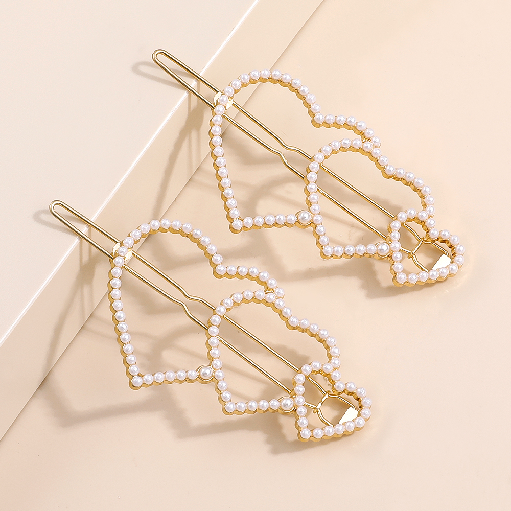 2022 New Fashion Elegant Pearl Inlaid Heart-shaped Bang Side Hairpin display picture 1