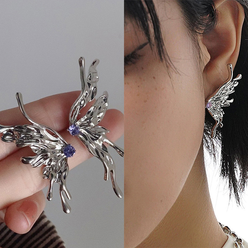 Fashion Liquid Metal Asymmetric Butterfly Purple Zircon Inlaid Earrings display picture 1