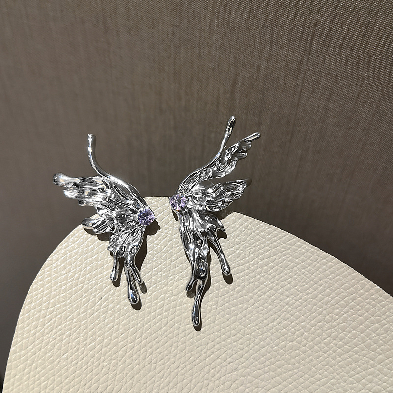 Fashion Liquid Metal Asymmetric Butterfly Purple Zircon Inlaid Earrings display picture 5
