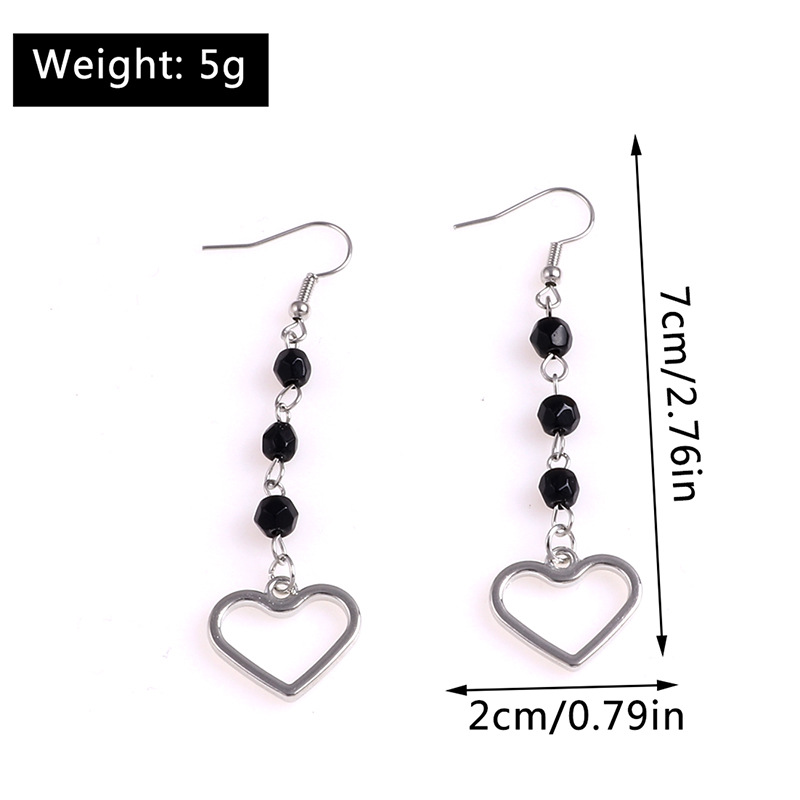 Simple Style Long Tassel Beads Hollow Heart Pendant Earrings display picture 1