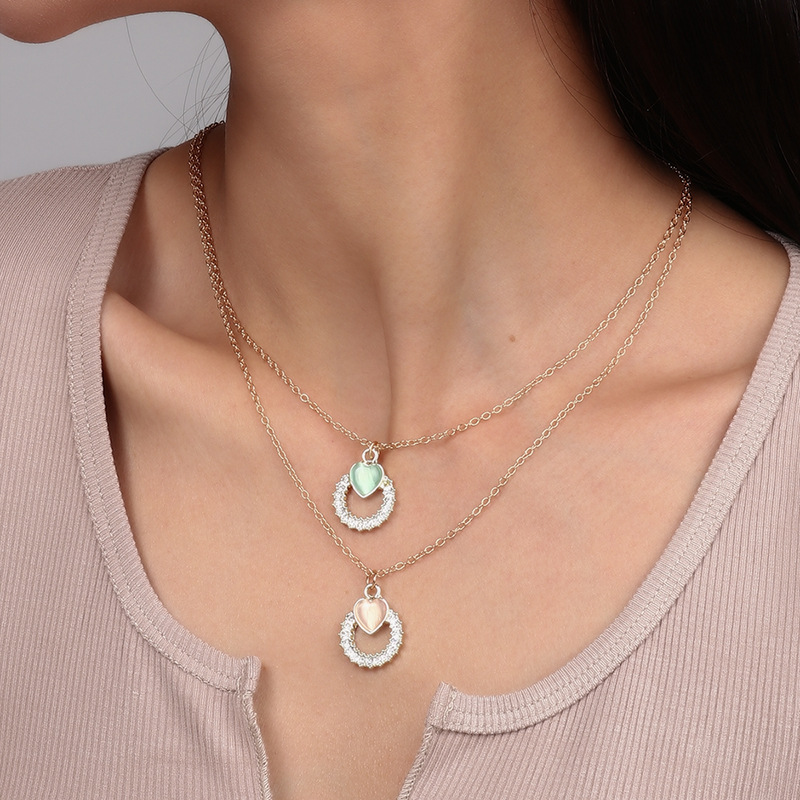 Fashion Hollow Circle Inlaid Heart Crystal Pendant Double Layer Necklace display picture 2