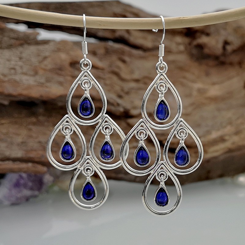 Creative Peacock Blue Moonstone Drop-shaped Hollow Pendant Earrings display picture 3