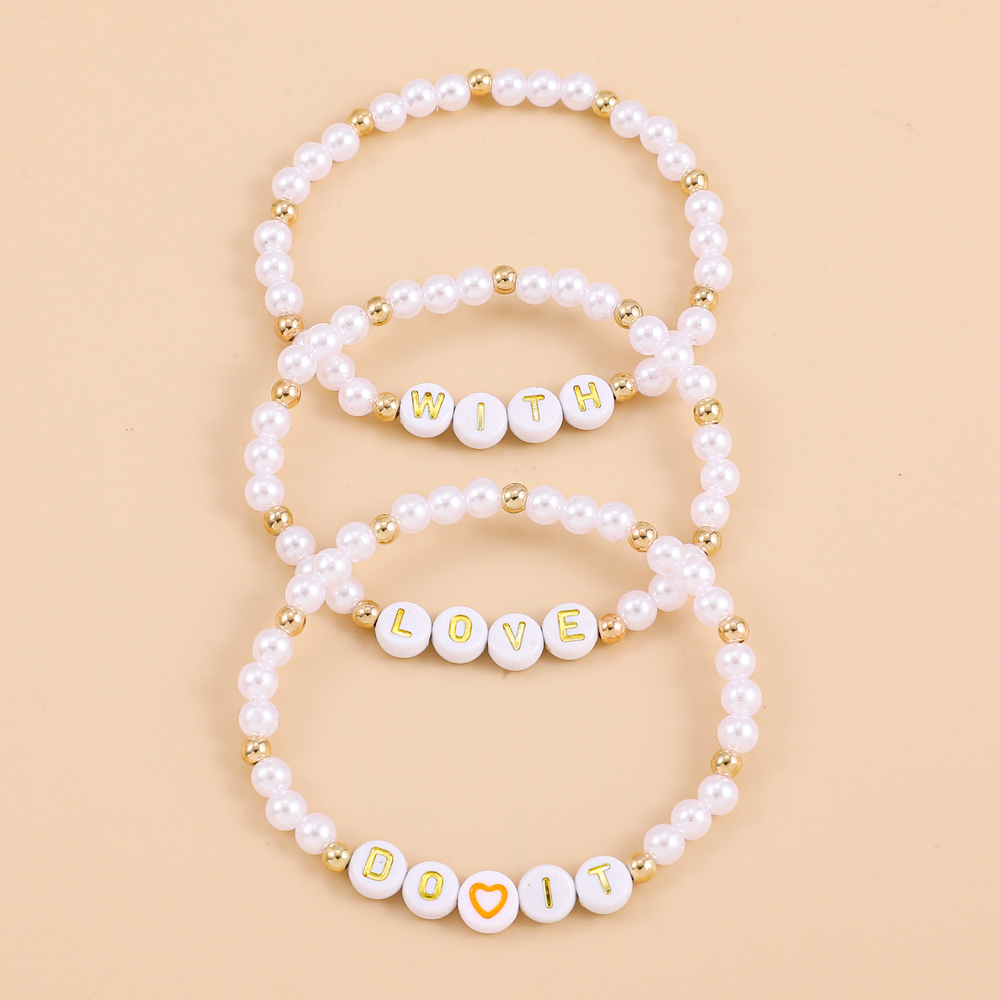 Fashion Bohemian Woven Imitation Pearl Retro Stitching Letter Love Chain Bracelet display picture 2