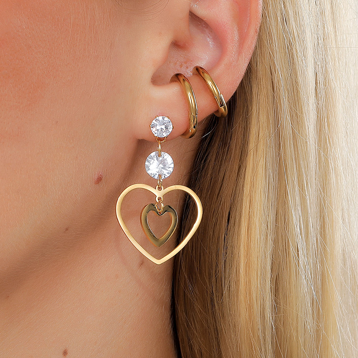 New Trendy Golden Hollow Heart Shape Electroplated Stainless Steel  Zircon  Earrings display picture 1