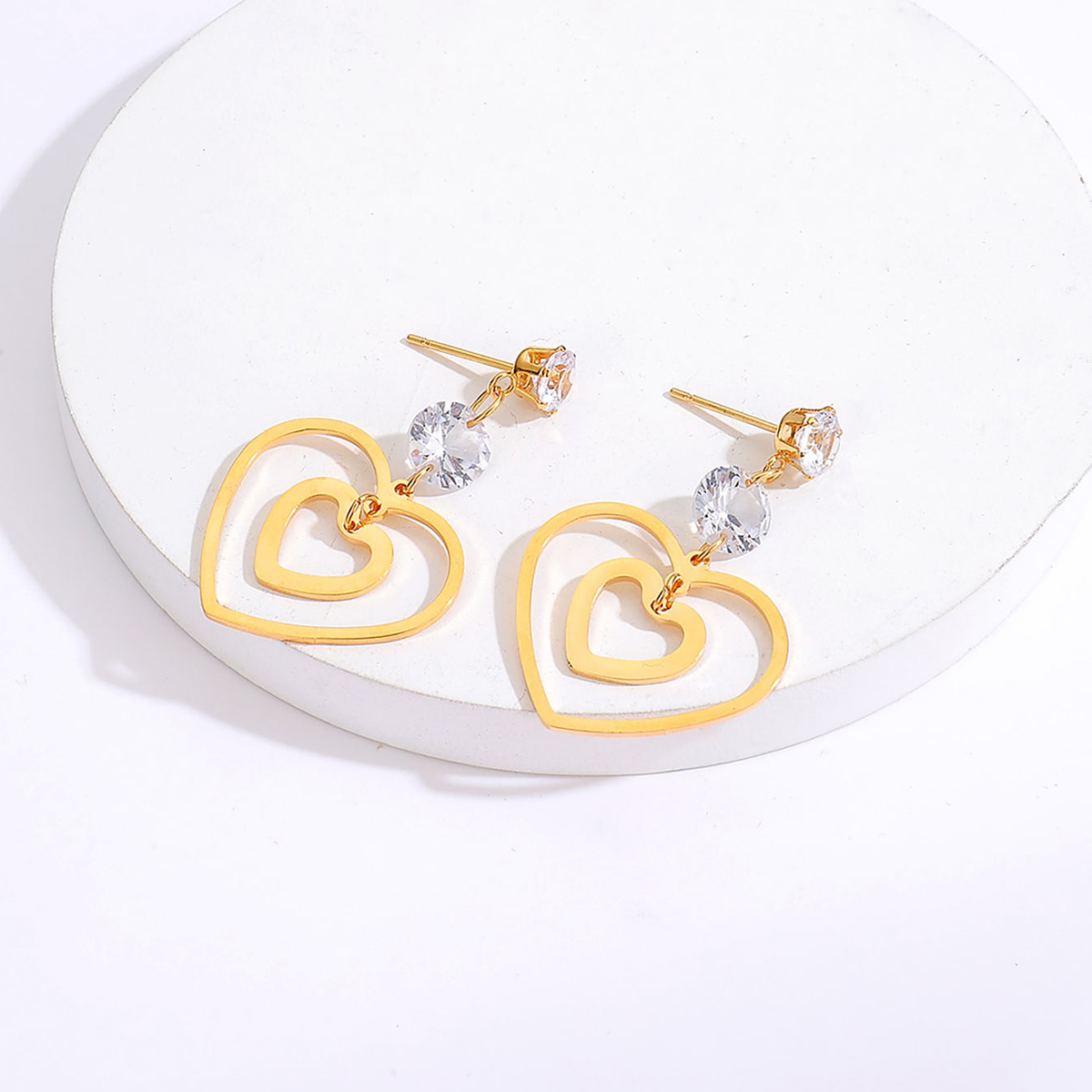 New Trendy Golden Hollow Heart Shape Electroplated Stainless Steel  Zircon  Earrings display picture 2