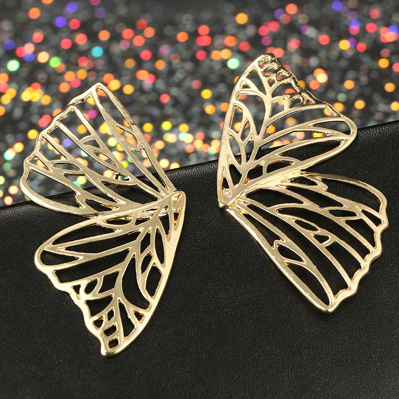New Fashion Geometric Pattern Leaf-shaped Metal Irregular Leaf Alloy Earrings display picture 5