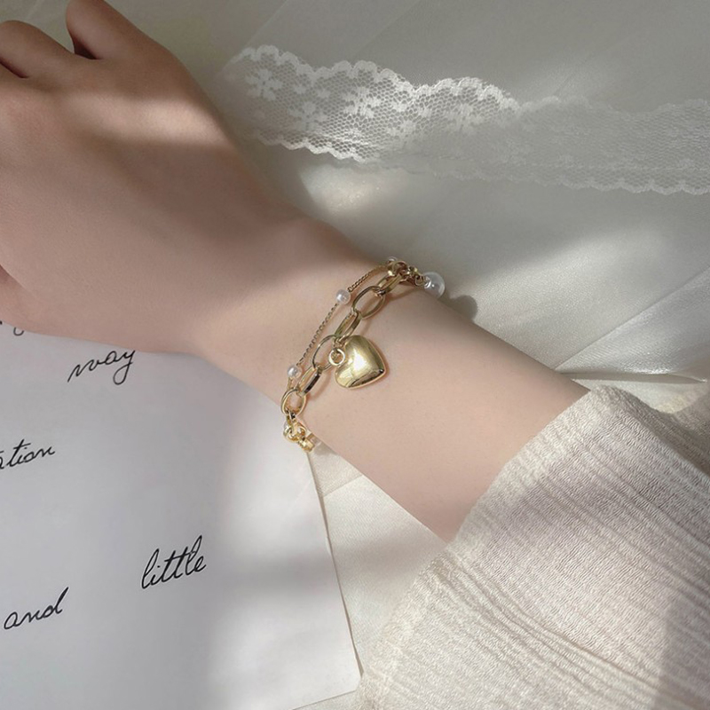 Mode Süss Herz Legierung Eingelegte Perlen Künstliche Perlen Frau Armbänder display picture 1