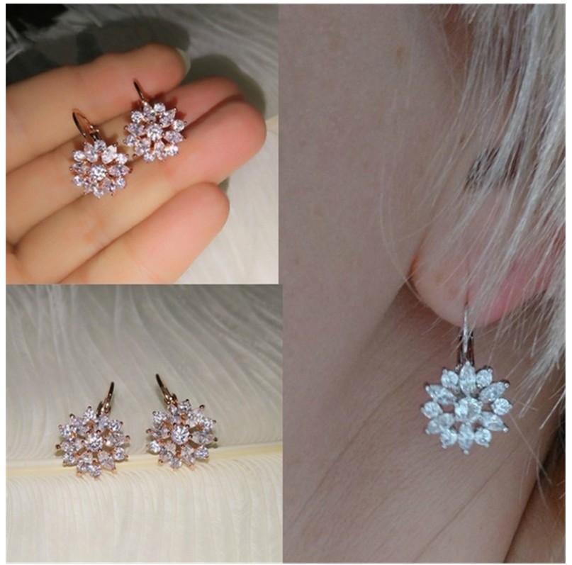 Fashion Simple Geometric Chrysanthemum Inlaid Diamond Alloy Ear Clip Earrings display picture 1