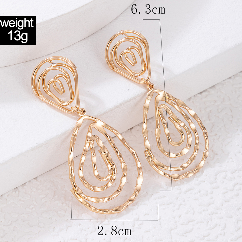Fashion Simple Geometric Triangle Spiral Hollowed Drop Shape Alloy Earrings display picture 1
