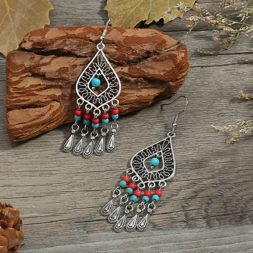 Femmes Style Ethnique Gland Alliage Boucles D'oreilles Inlay Turquoise Boucles D'oreilles Comme Image display picture 2