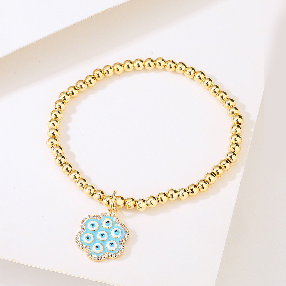 New Style Copper Plated 18k Gold Zirconia Oil Drop Blue Eye Flower Bracelet display picture 1