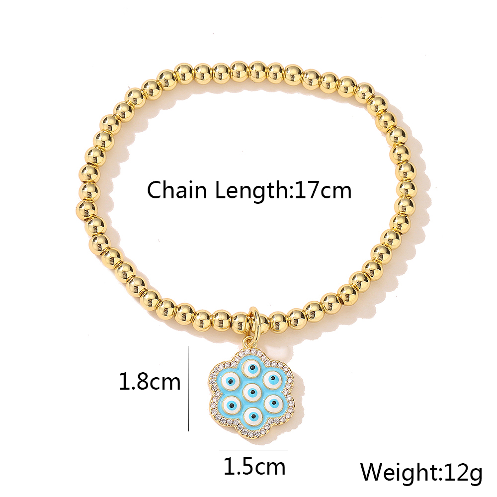 New Style Copper Plated 18k Gold Zirconia Oil Drop Blue Eye Flower Bracelet display picture 4