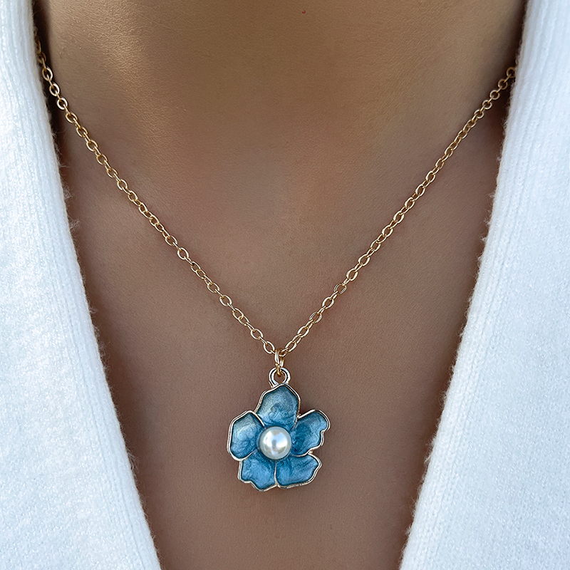 Fashion Blue Drop Oil Pearl Inlaid Small Five-petal Flower Necklace display picture 1