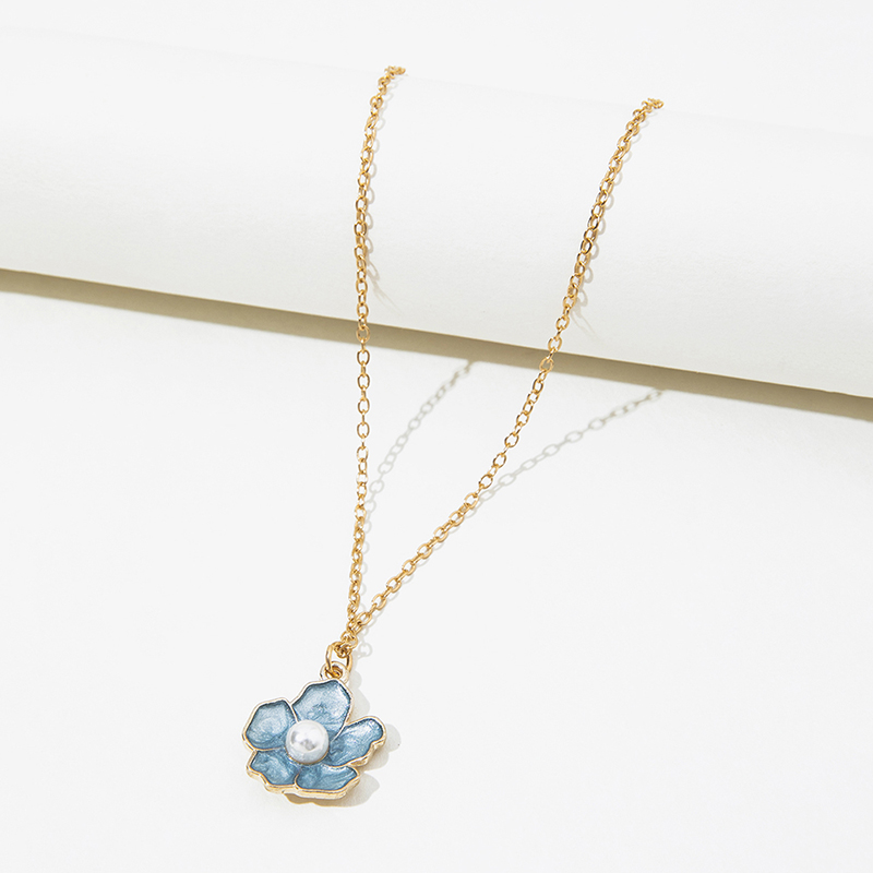 Fashion Blue Drop Oil Pearl Inlaid Small Five-petal Flower Necklace display picture 3