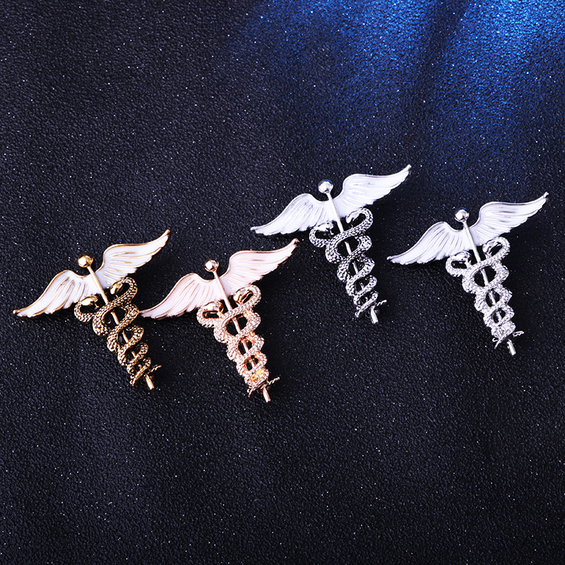 Classical Business Wedding Angel Wings Snake Alloy Zinc Spray Paint Men'S Brooches display picture 2