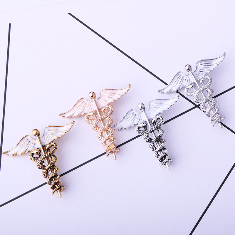 Classical Business Wedding Angel Wings Snake Alloy Zinc Spray Paint Men'S Brooches display picture 4