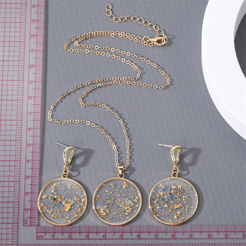 Vintage Style Dried Flower Geometric Transparent Gold Foil Pendant Earrings Necklace Set display picture 2