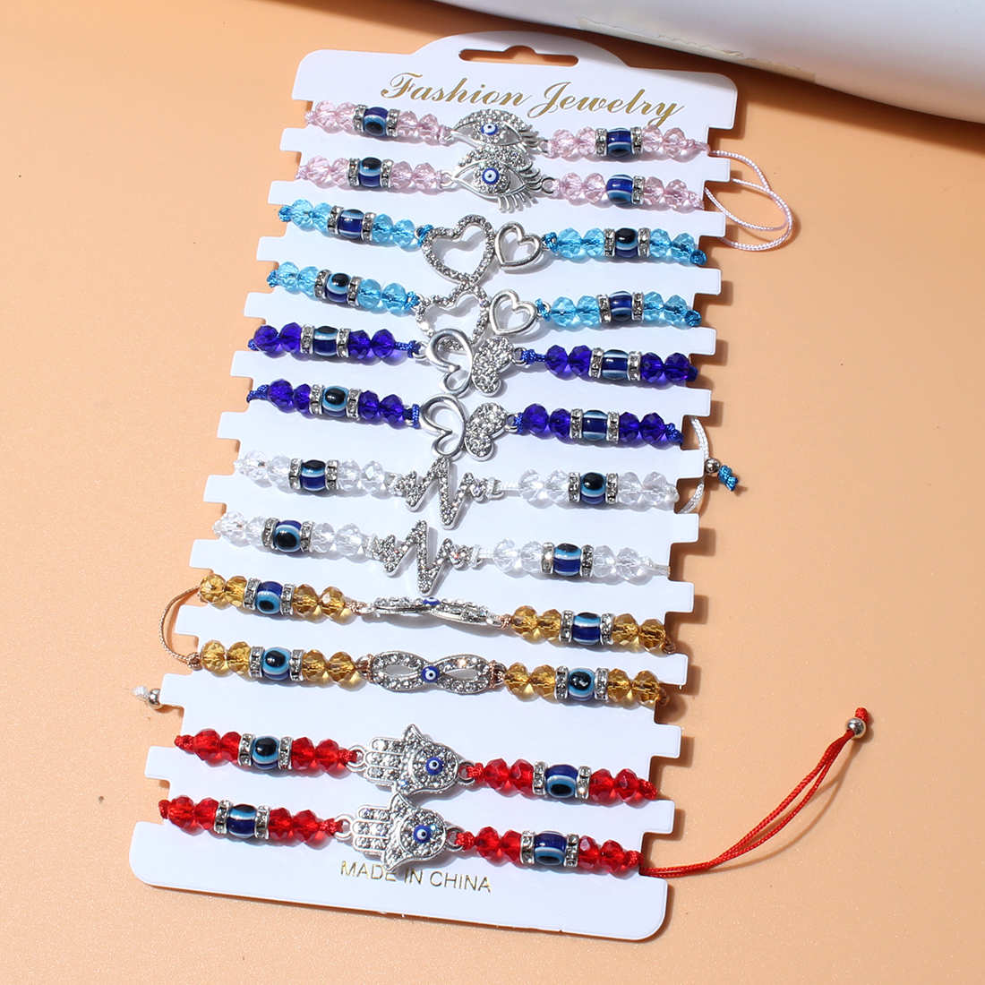 Fashion Bohemian Style Woven Crystal String Beads Devil's Eye Drop Oil Palm Alloy Bracelet display picture 5