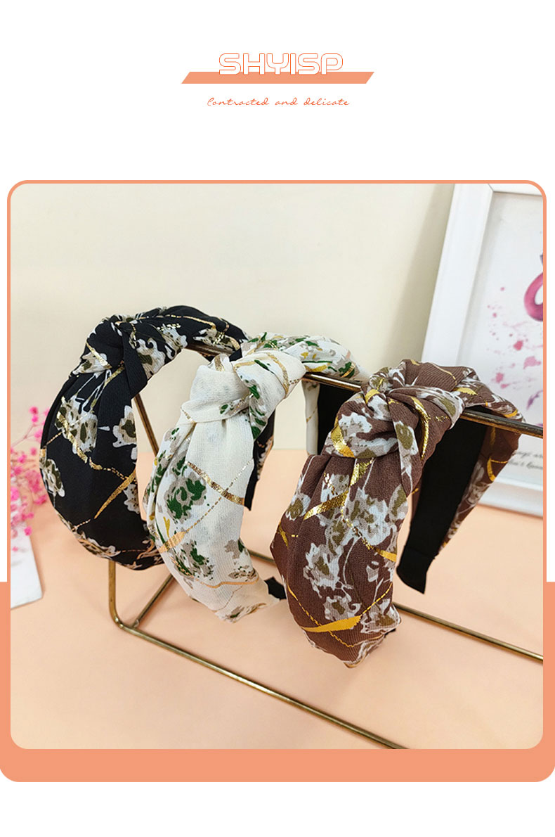 New Style Floral Fabric Knotted Bronzing Wide Brim Hair Band display picture 1