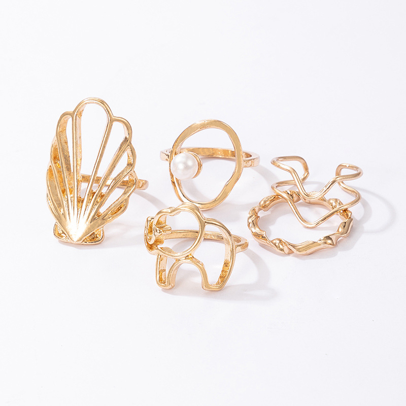 Fashion Hollow Geometric Wave Shell Pearl Ring Set display picture 4