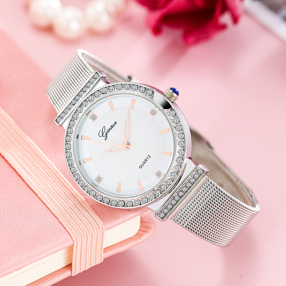 Mode Damen Uhr Mesh Gürtel Eingelegte Diamanten Einfache Quarzuhr display picture 5