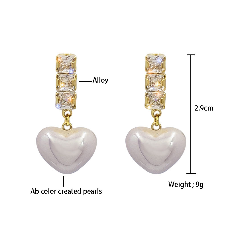 Fashion Simple Zircon Pearl Heart-shaped Female Earrings display picture 1