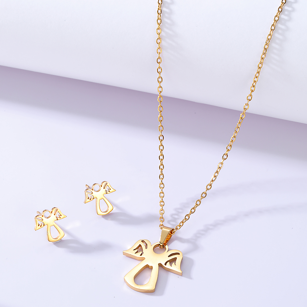 Simple Fashion Plated Angel Gold Stainless Steel Necklace Earrings Set display picture 1