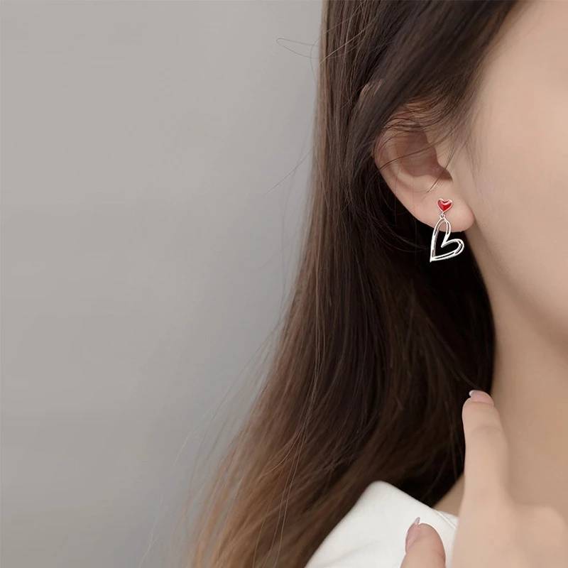 Fashion Simple Asymmetric Shiny Heart Long Alloy Ear Studs Ear Clip display picture 3