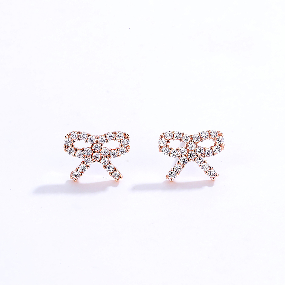 Fashion Ornament Copper Electroplated 18k Gold Inlaid Zircon Bow Earrings display picture 3