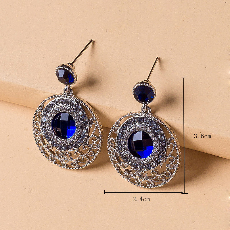 Fashion Elegant Hollow Rhinestone Inlaid Alloy Earrings Wholesale display picture 1