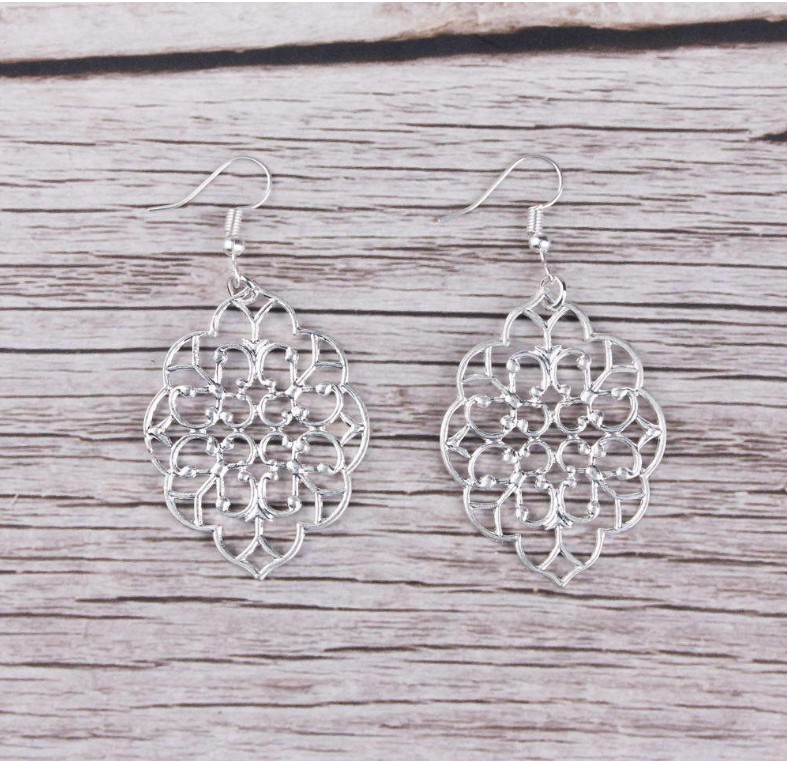 Fashion New Geometric Carved Window Flower Hollow Alloy Earrings display picture 2