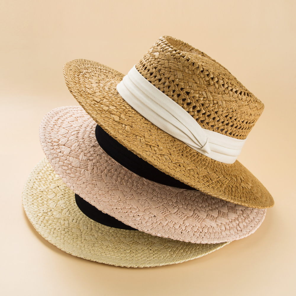 Fashion British Style Handmade Straw Woven Concave Top Hat Female Summer Vacation Seaside Sun-proof Beach Hat display picture 2