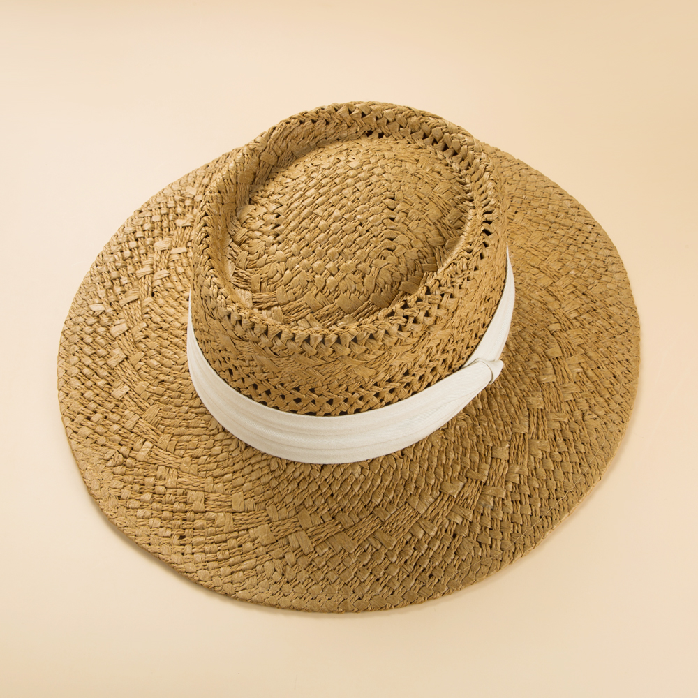 Fashion British Style Handmade Straw Woven Concave Top Hat Female Summer Vacation Seaside Sun-proof Beach Hat display picture 5