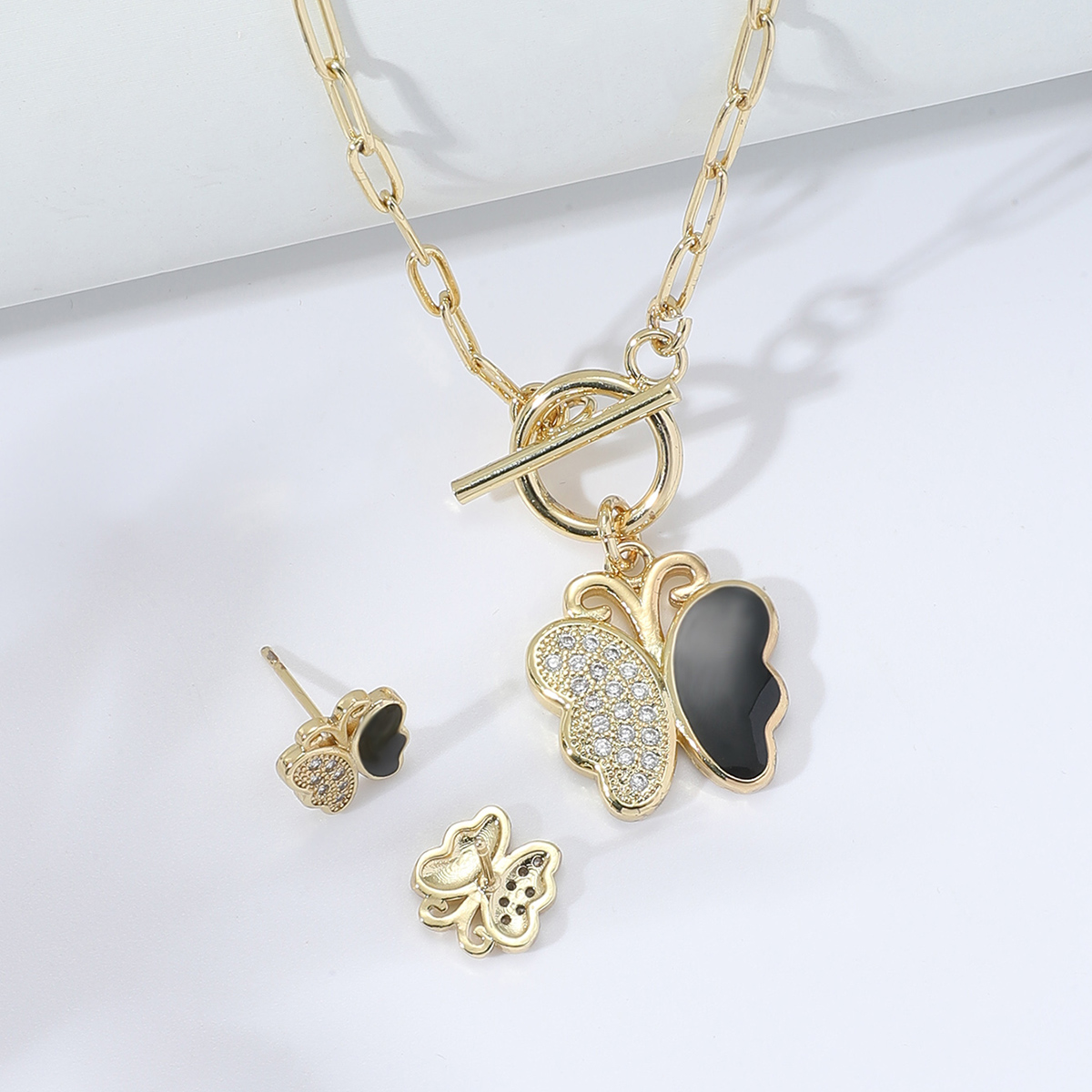 Mode Einfache Schmetterling-förmigen Intarsien Zirkon Überzug Gold Kupfer Halskette Ohrringe Set display picture 1