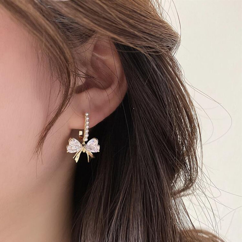 Fashion Bow Inlay Pearl Zircon New Alloy Earrings display picture 2
