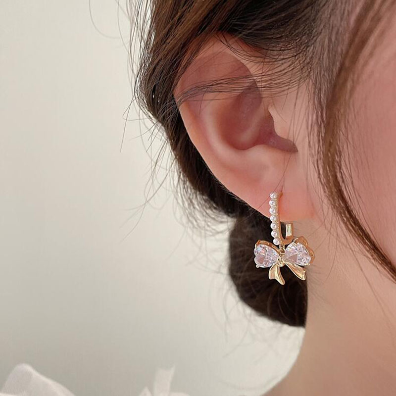 Fashion Bow Inlay Pearl Zircon New Alloy Earrings display picture 3