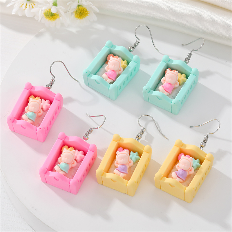 Fashion New Cute Sleep Baby Crib Simulation Three-dimensional Toy Earrings Resin display picture 1