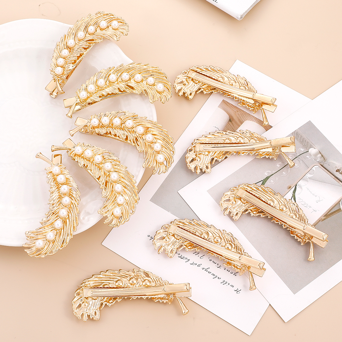 10 Pcs Feather Shaped Metal Inlay Pearl Hair Clip Accessories display picture 4