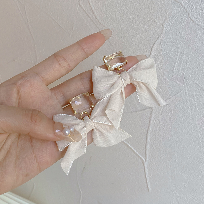 Sweet Geometric Bow Knot Cloth Earrings display picture 1
