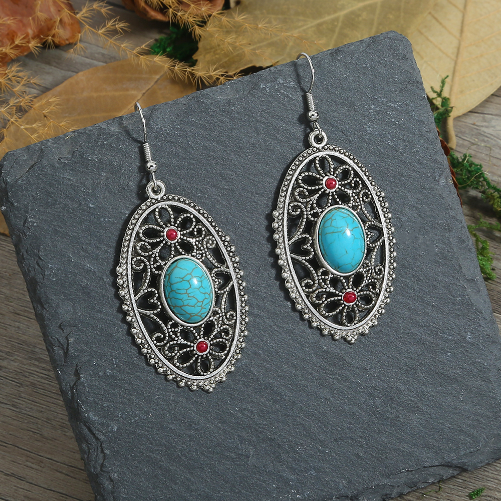 Vintage Style Oval Flower Alloy Hollow Out Turquoise Earrings display picture 5
