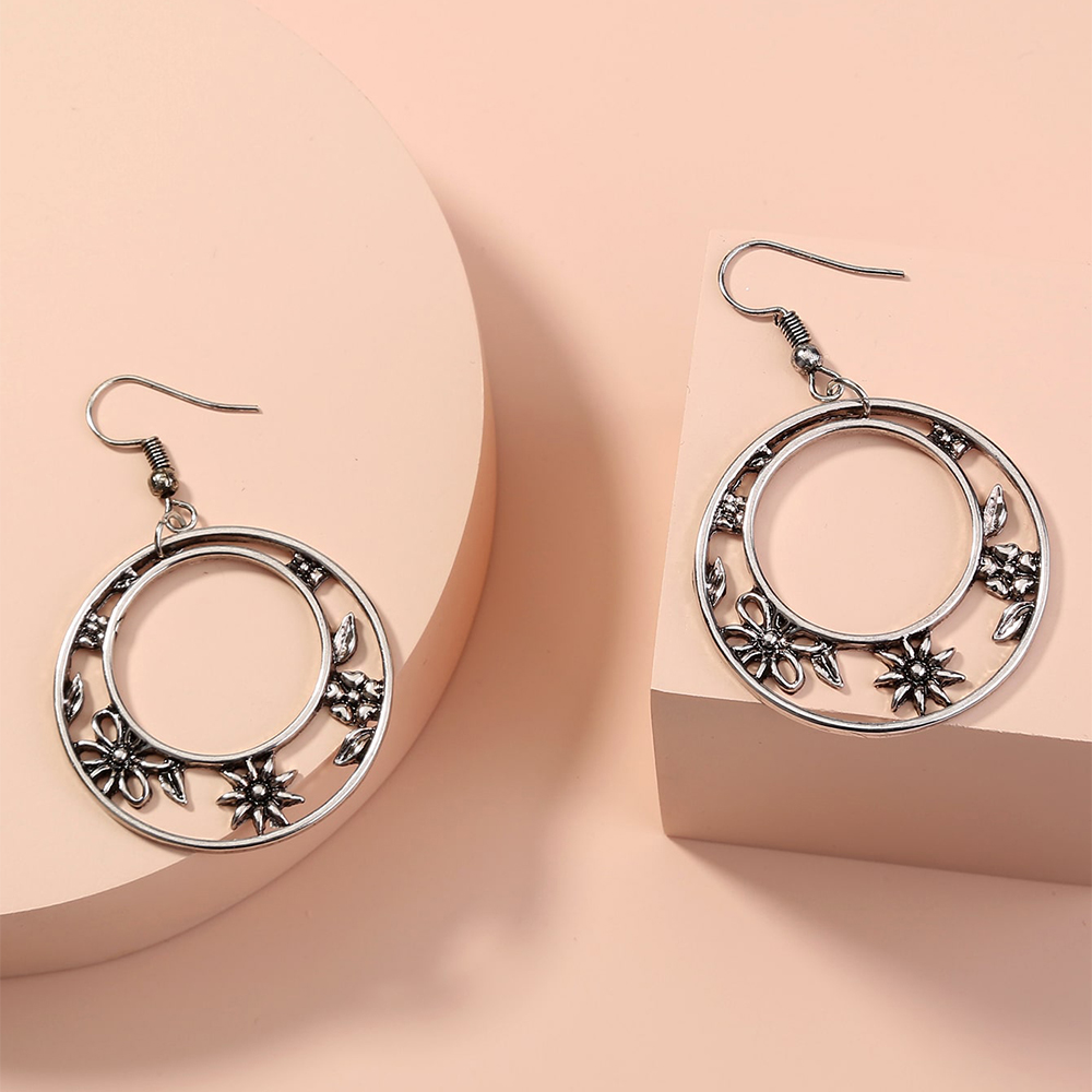 Fashion Retro Simple Geometric Snowflake Flower Alloy Earrings display picture 3