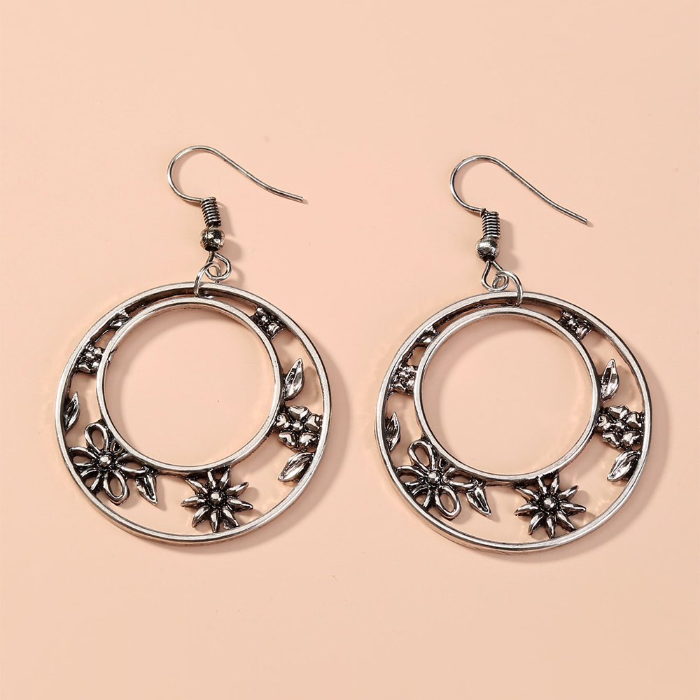 Fashion Retro Simple Geometric Snowflake Flower Alloy Earrings display picture 2