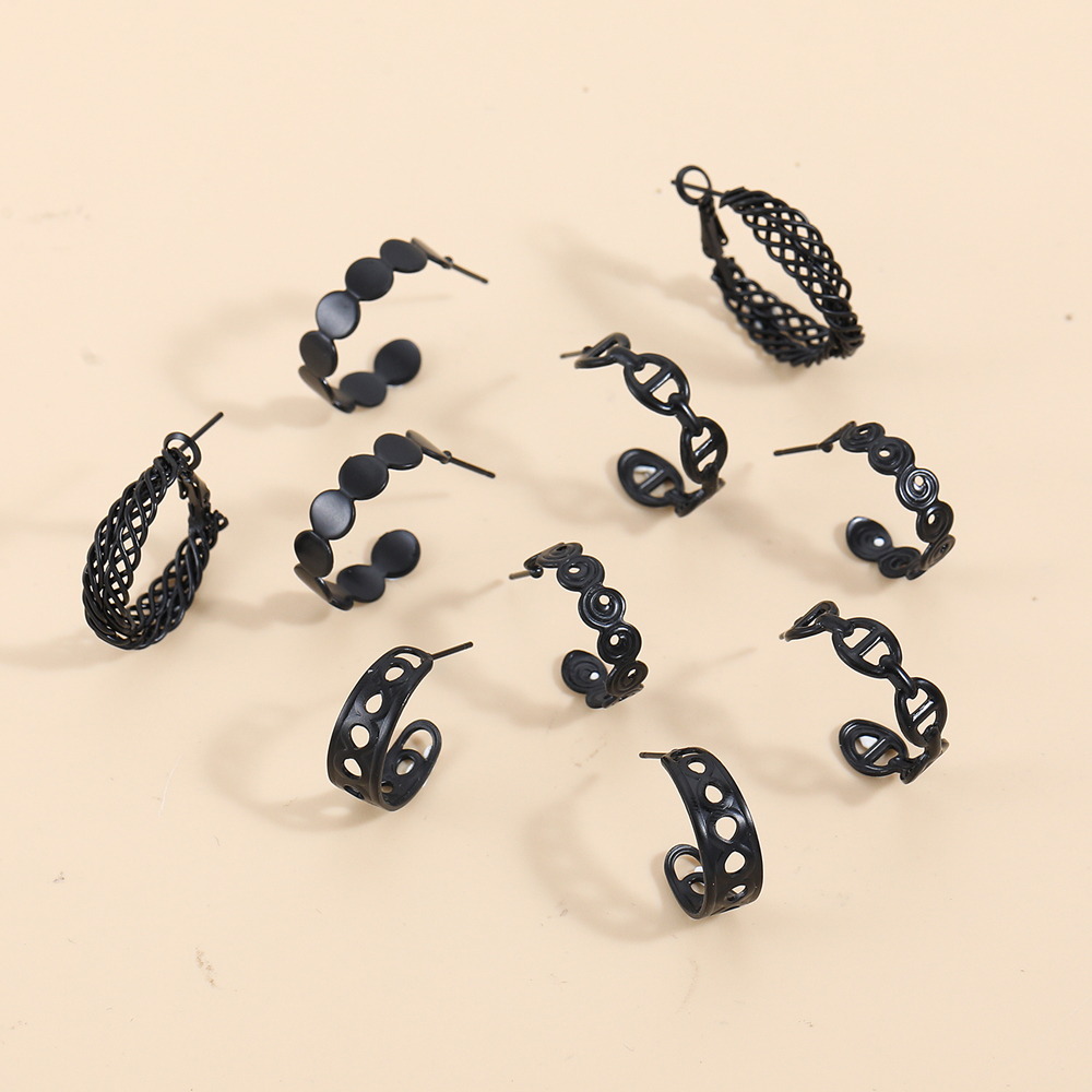 Retro C Shape Hollow Out Alloy Earrings display picture 6