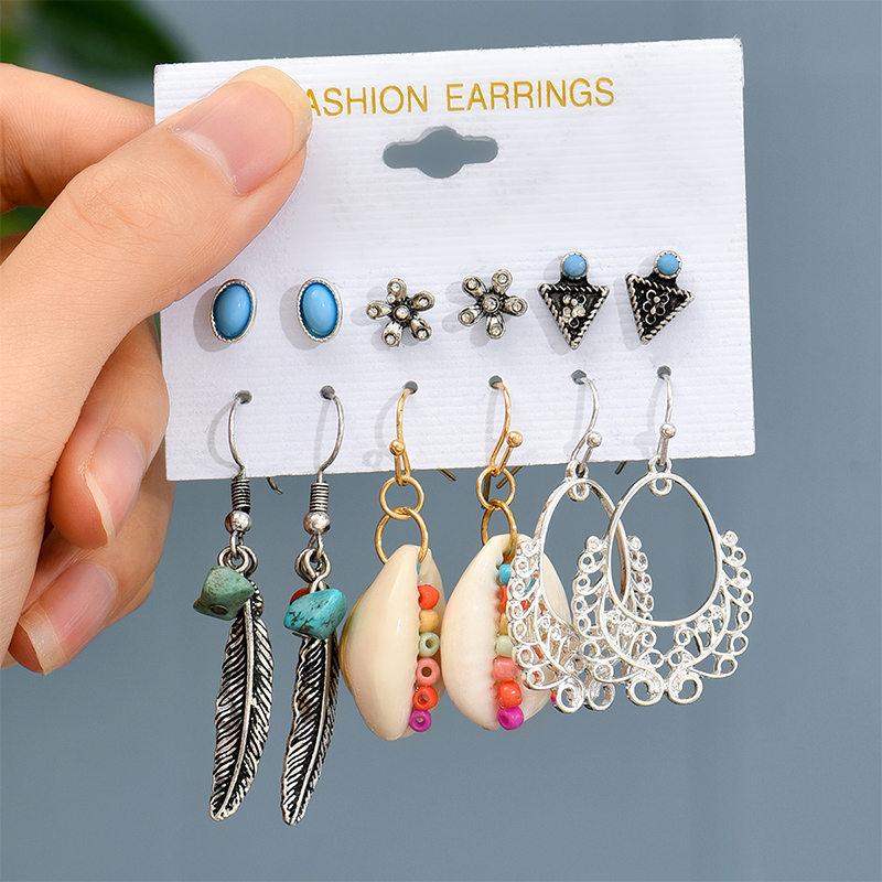 Retro Feather Flower Shell Arylic Alloy Shell Earrings Inlay Rhinestone Earrings display picture 1