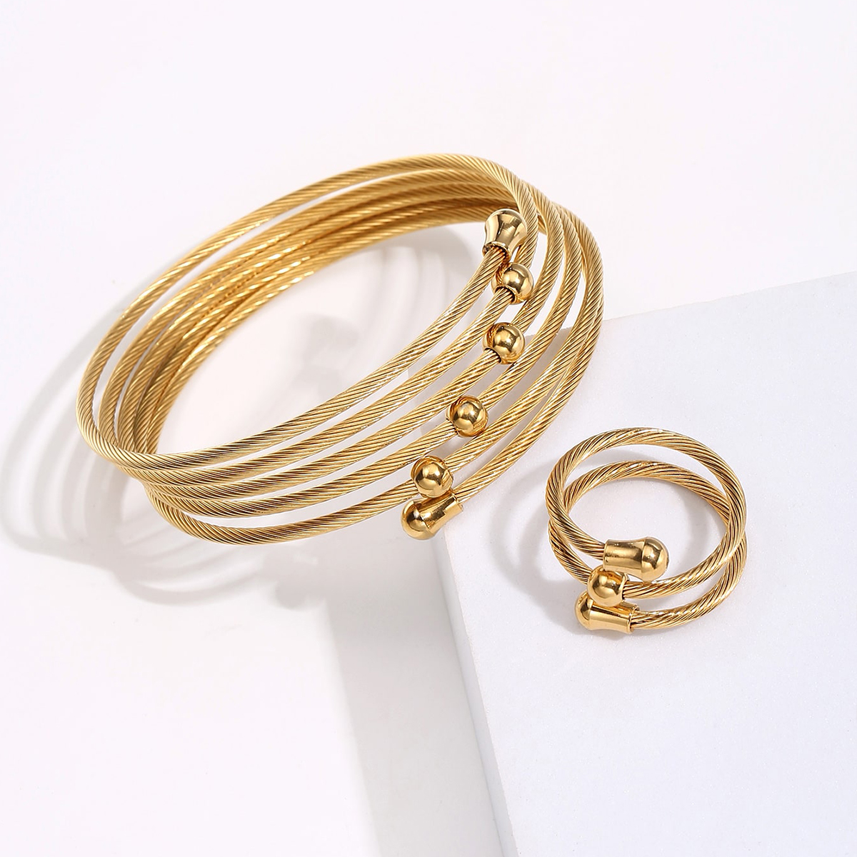 Wholesale Fashion Spiral Stripe Steel Plating Rings Bracelets display picture 2
